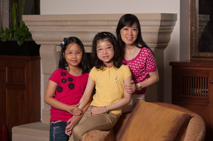 Emma Tran with her mother and sister.