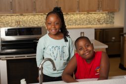 Sydney and her Brother in The Children's Inn's Kitchen