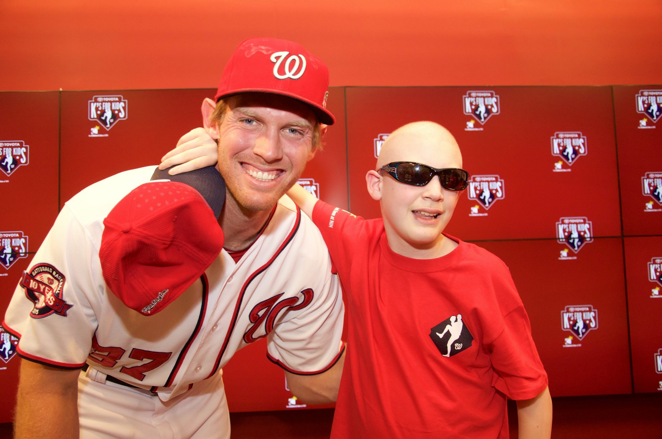 Washington National player and child in locker room