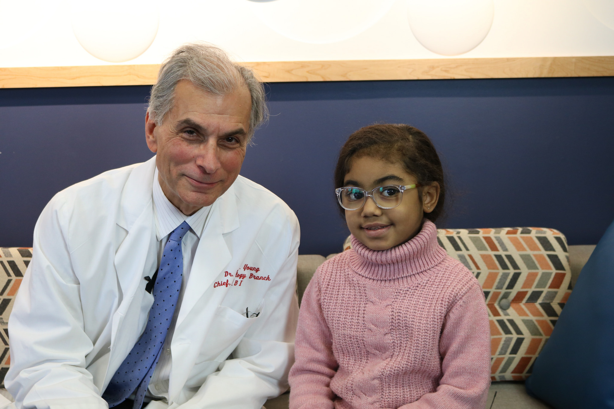 Doctor and young patient sit next to each other at the The Inn