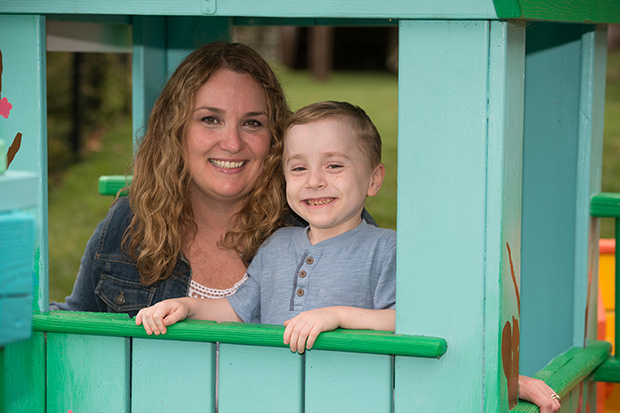 Hayden and his mother in a play house at The Inn