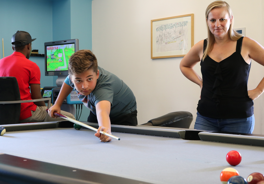 Tom playing pool at The Inn