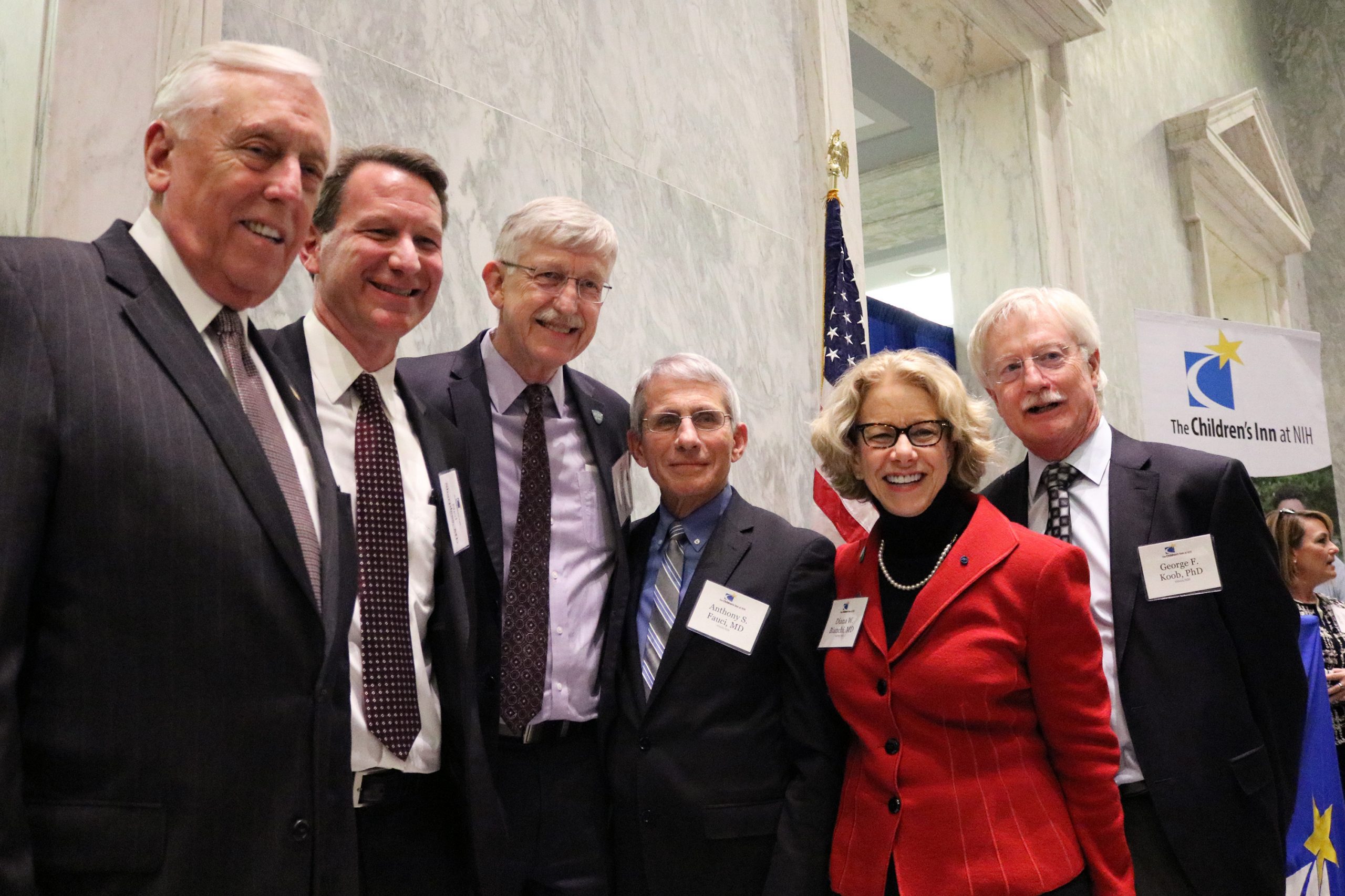 From left to right: Rep. Steny Hoyer, Sharpless, Dr. Collins, Dr. Fauci, Dr. Bianchi, George Koob