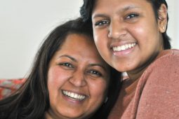Kavya Nadella holding her mother and posing for a photo