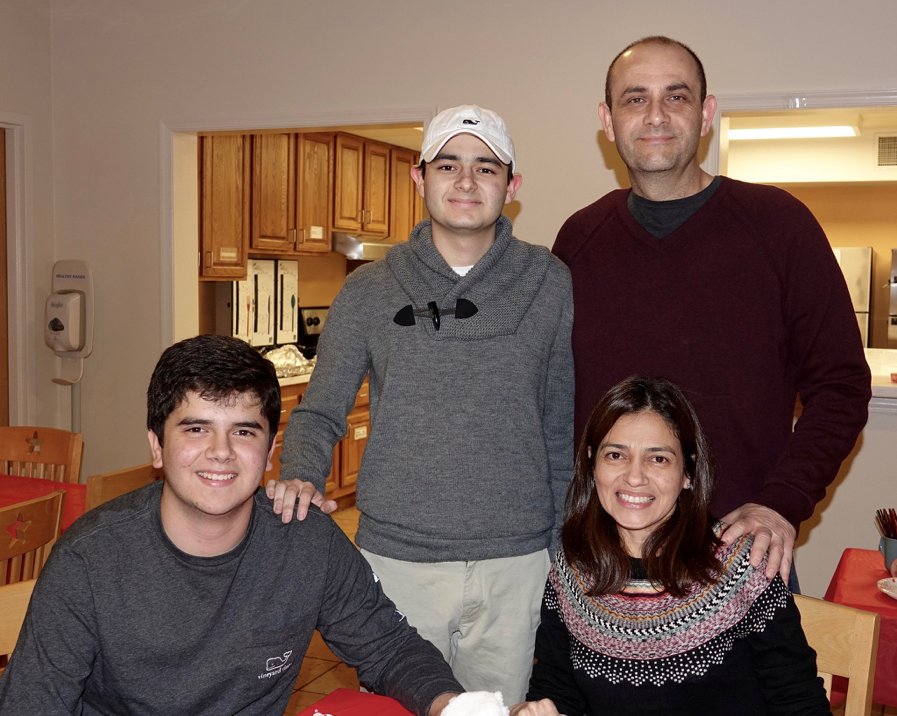 Andres family of four pose for a group photo at The Inn