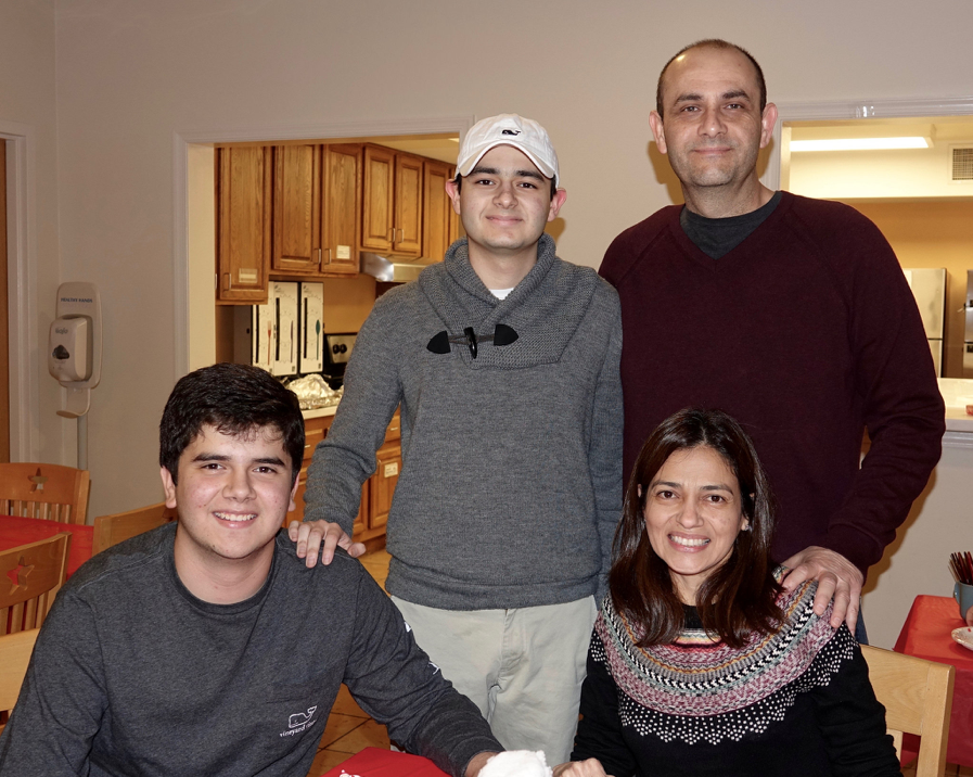 Andres with his family at dinner