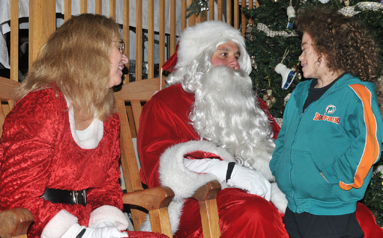Santa and Mrs. Claus with Inn resident Isaac