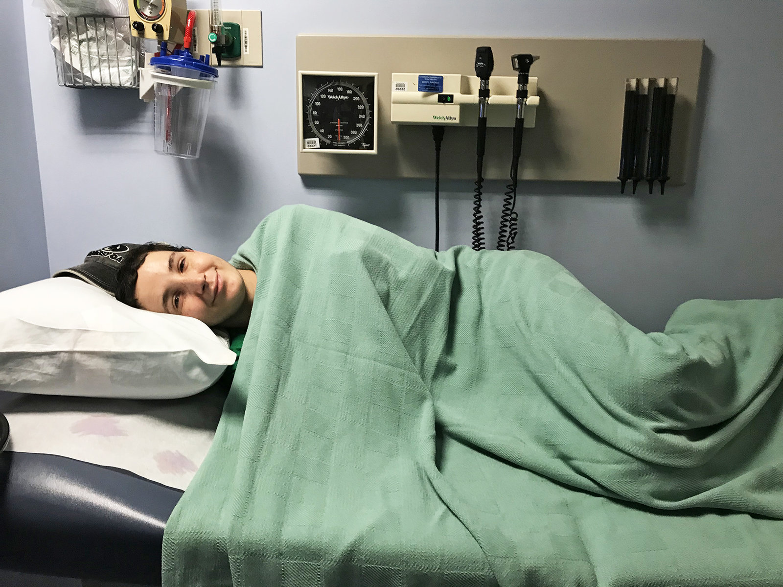 Aaron Reid in his hospital bed