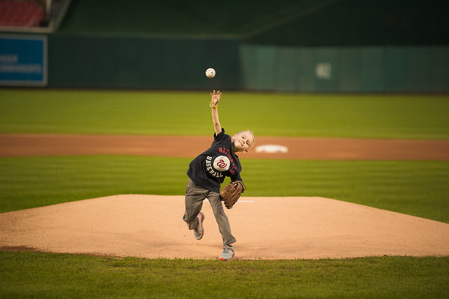 Young boy from The Inn throwing a pitch on the Nationals field