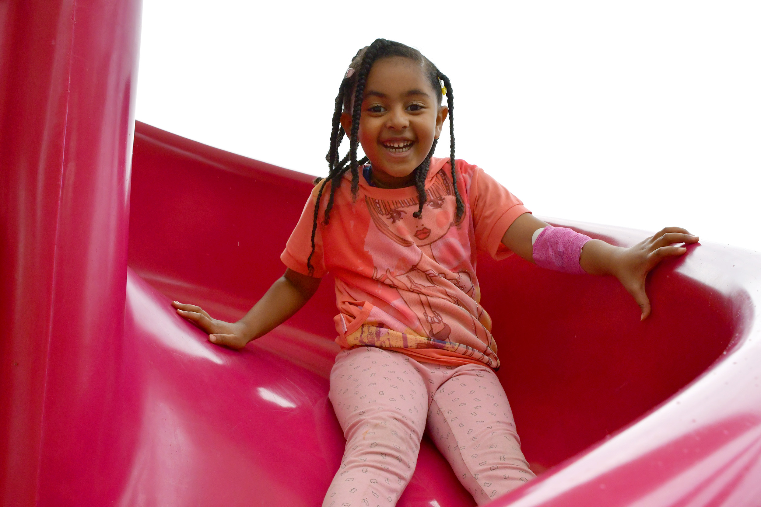 child on a slide