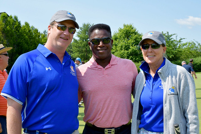 Group of three men at the 2019 Golf tournament