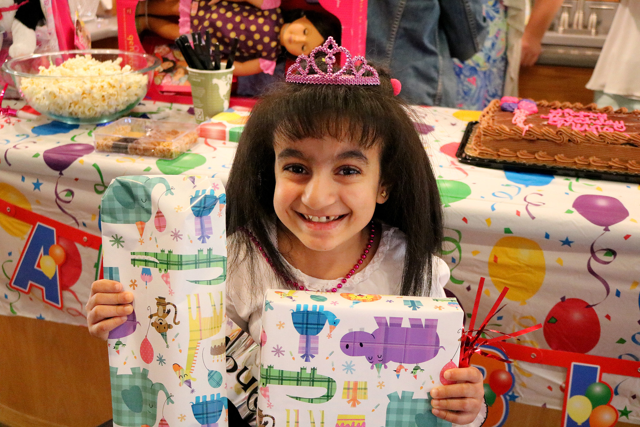 girl opening presents