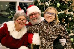 Madison with Santa and Mrs. Claus at the holidays