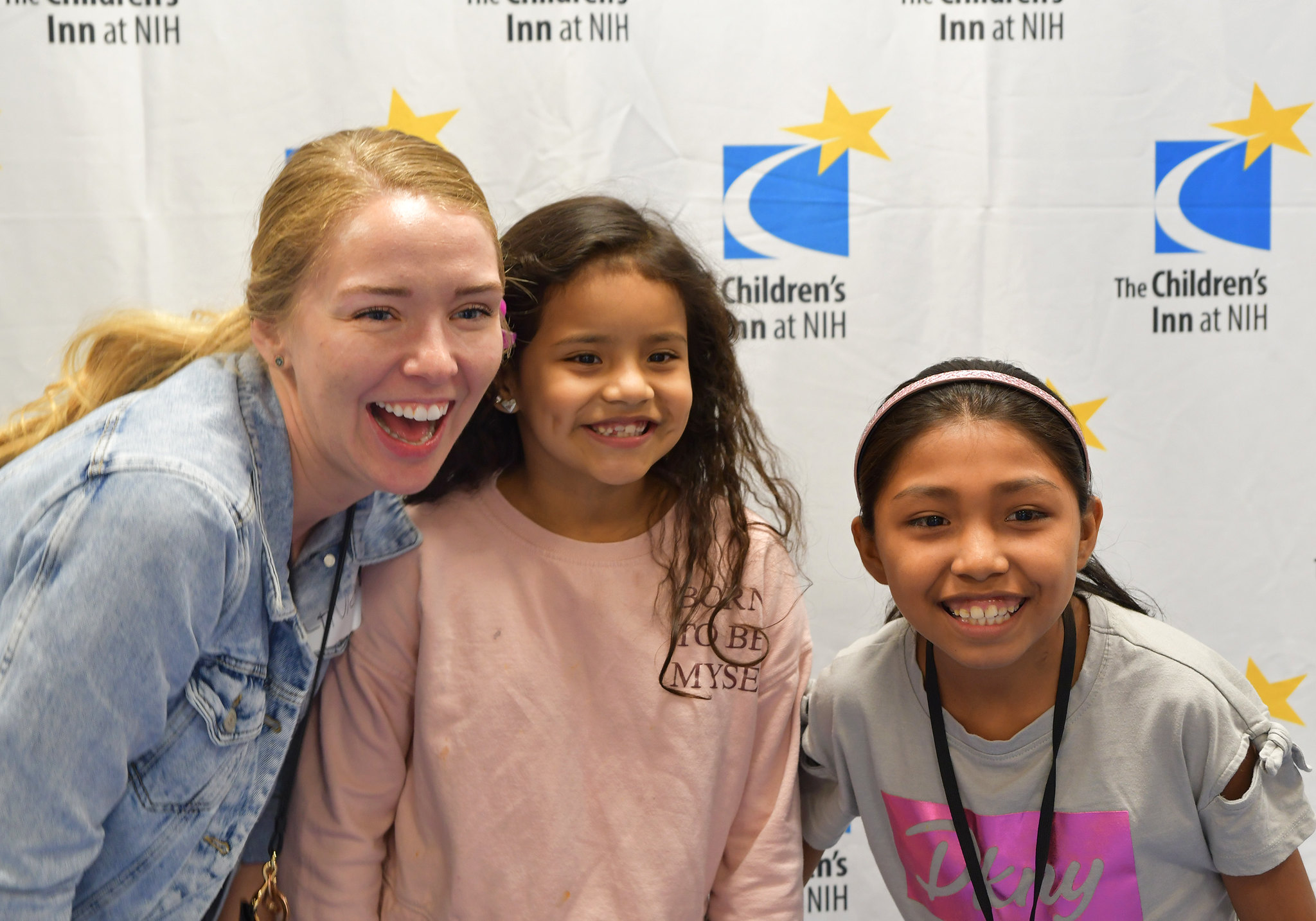 Inn residents Melva, Thais, and Inn volunteer Laura