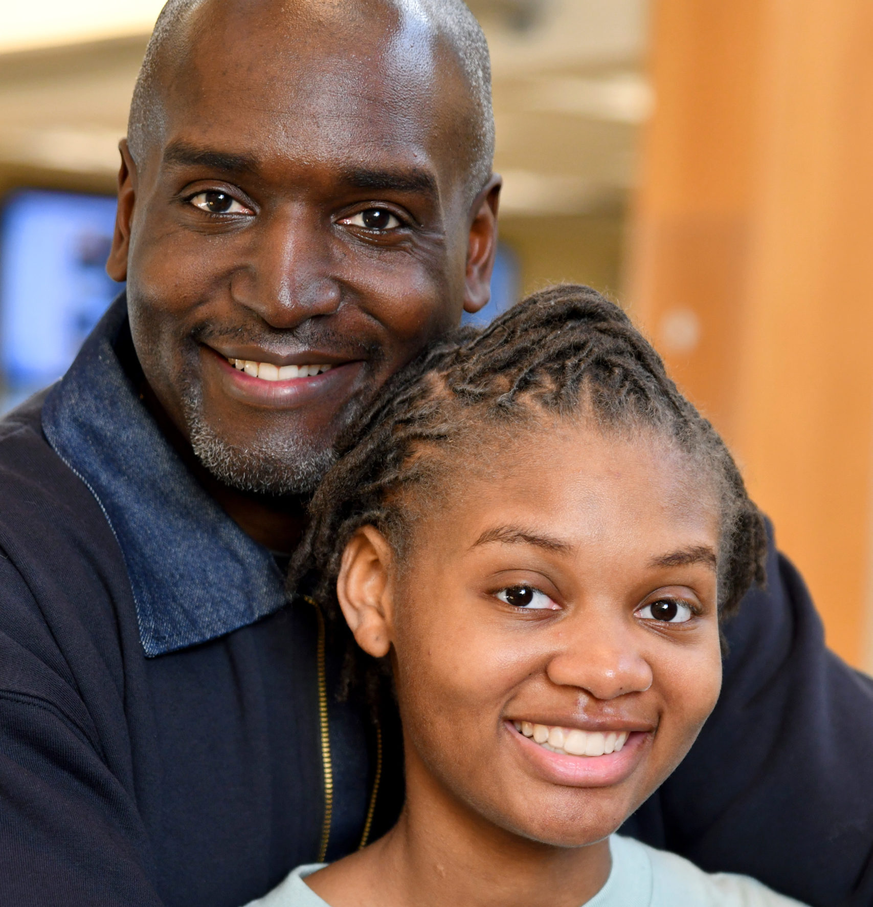 young child and her father