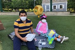 Residents on the playground wearing masks