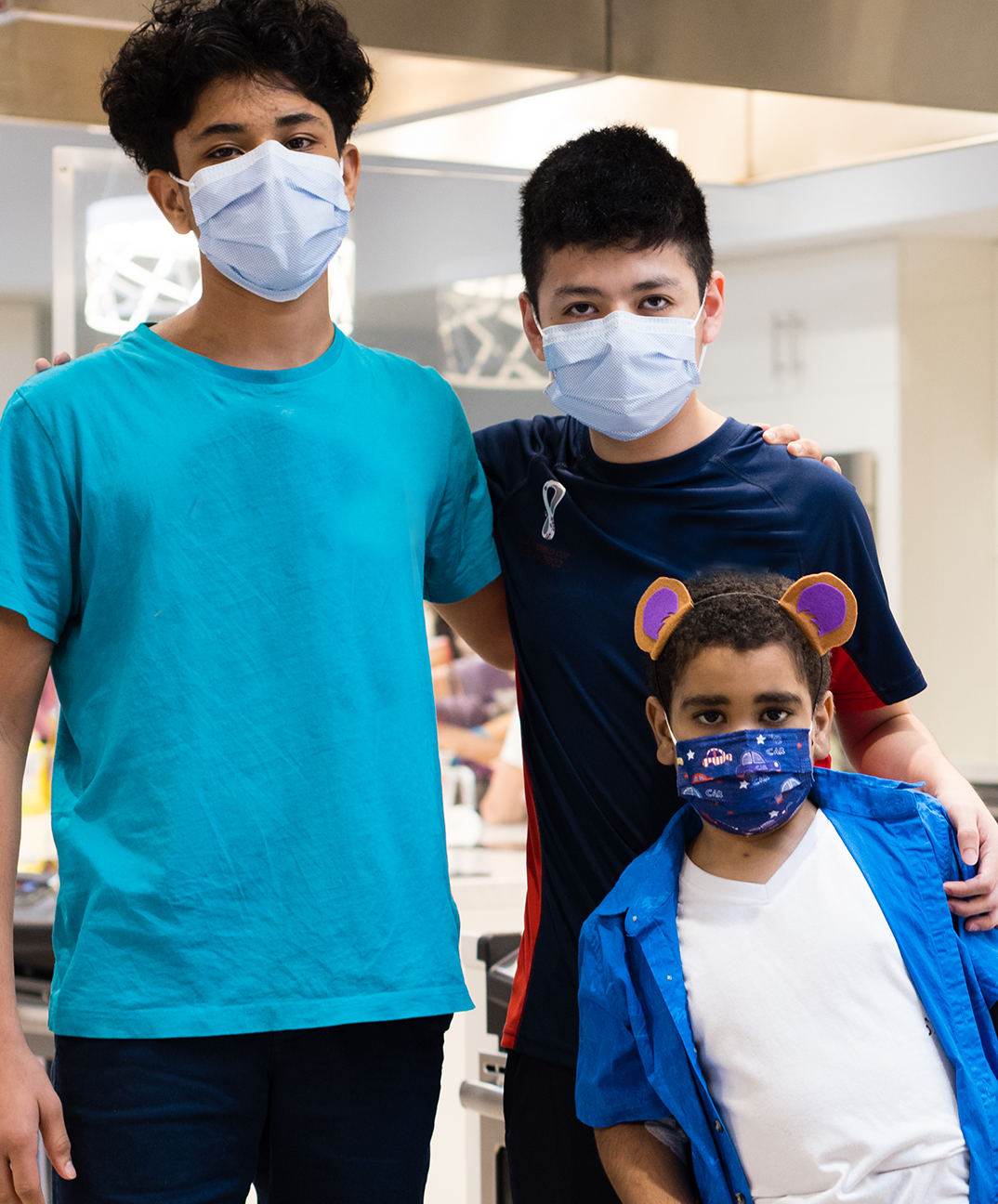 three boys in the kitchen