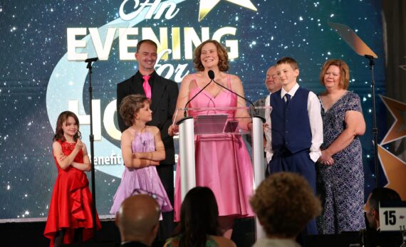 http://Family%20on%20stage%20at%20An%20Evening%20for%20Hope%20gala